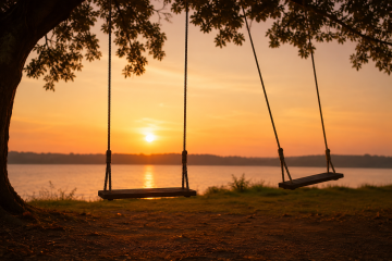 Dos columpios vacíos al atardecer simbolizando la niña interior, las heridas emocionales y la necesidad de sentirse vista y querida.